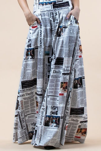 Newspaper print graphic, wide leg, elastic waist pants